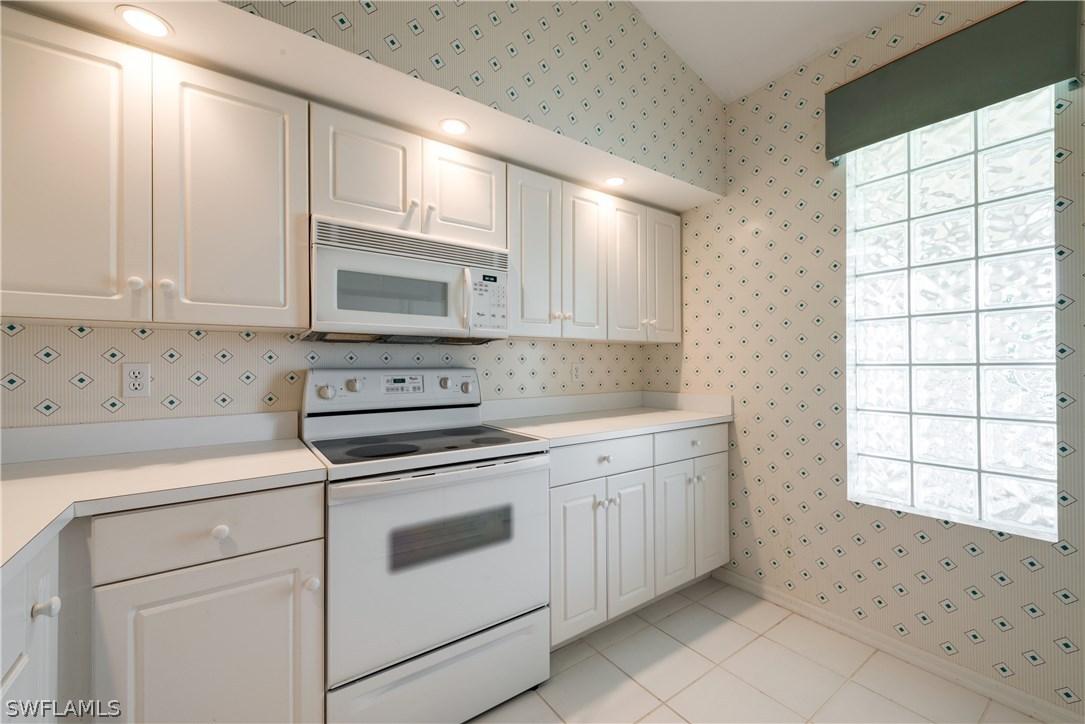 2271 Somerset Ridge Dr. #203, Lehigh Acres, FL 33973