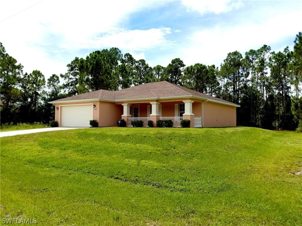 1074 Barnett St., Lehigh Acres, FL 33974