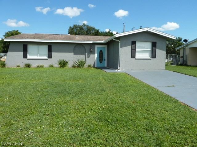 310 Morgan Cir., Lehigh Acres, FL 33936