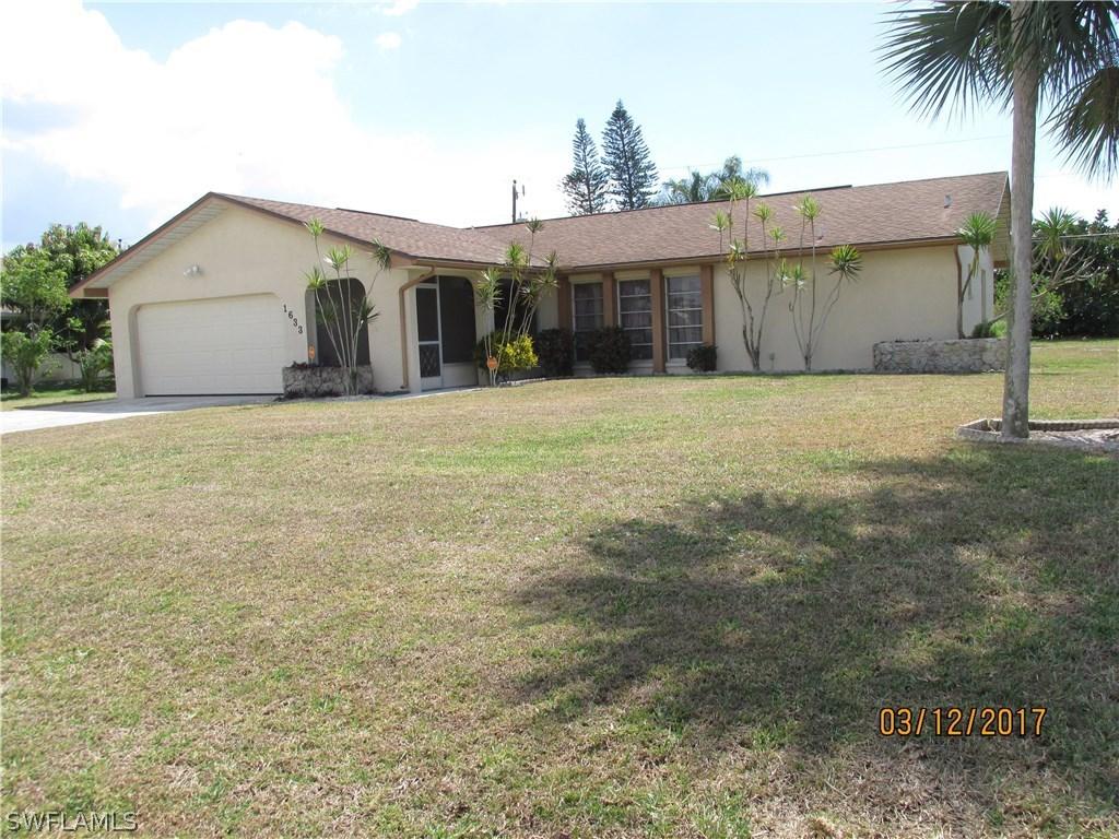 1633 Country Club Pkwy., Lehigh Acres, FL 33936