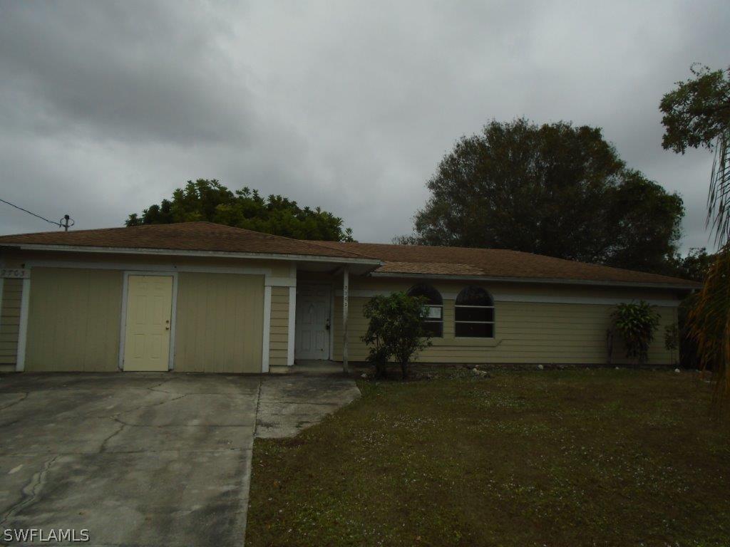 2703 11th St., Lehigh Acres, FL 33976