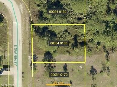 567 Aspen Ave., Lehigh Acres, FL 33974