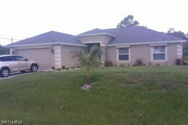 913 Alvin Ave., Lehigh Acres, FL 33971