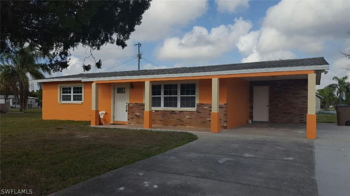 215 Canal Ct., Lehigh Acres, FL 33936