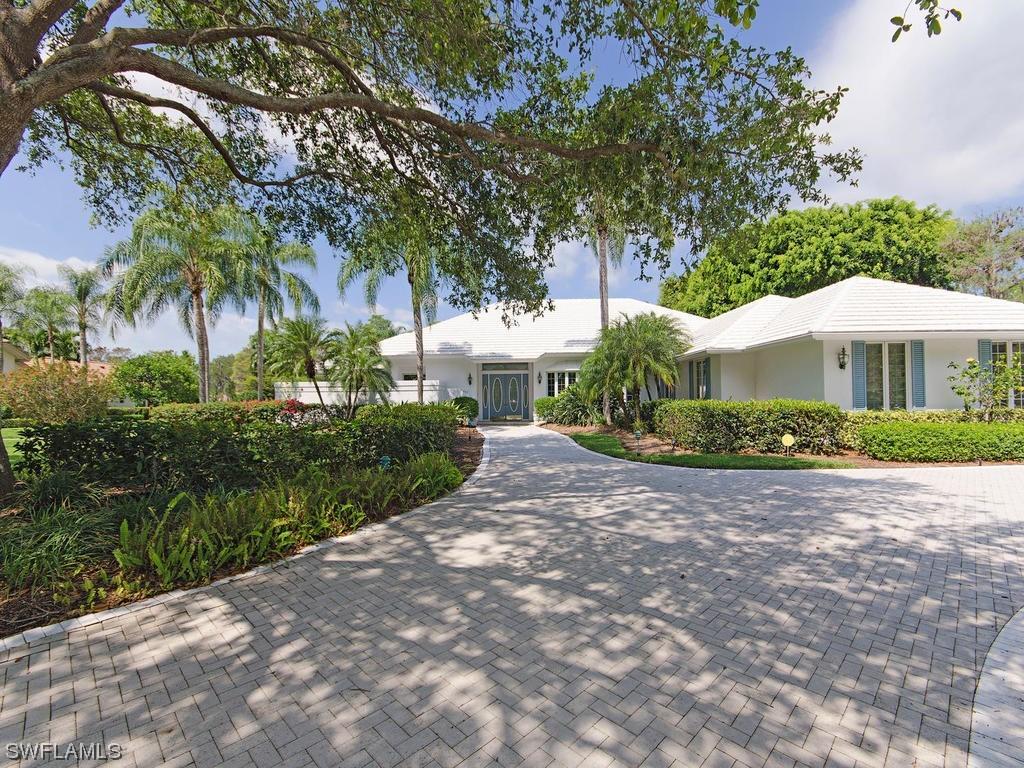 13087 Bald Cypress Ln., Naples, FL 34119