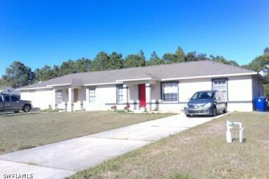 1021 Meadow Rd., Lehigh Acres, FL 33973