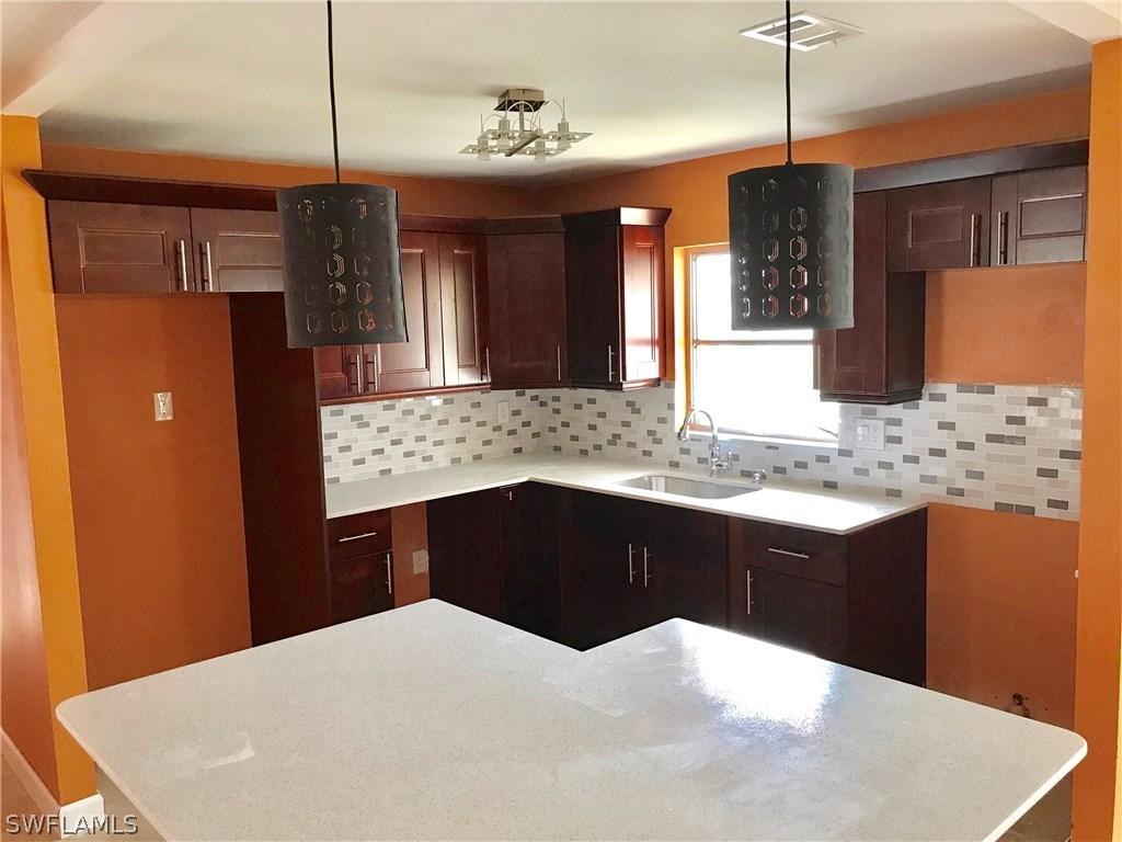 214 Fireside Ct., Lehigh Acres, FL 33936