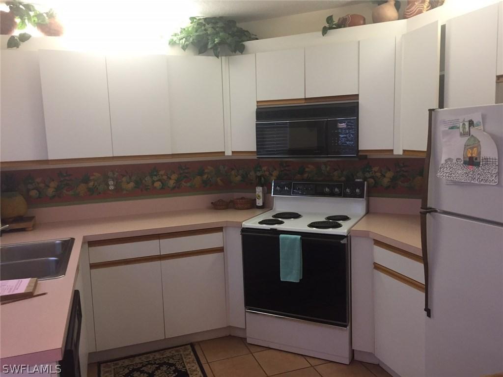 940 Woodshire Ln. #M11, Naples, FL 34105