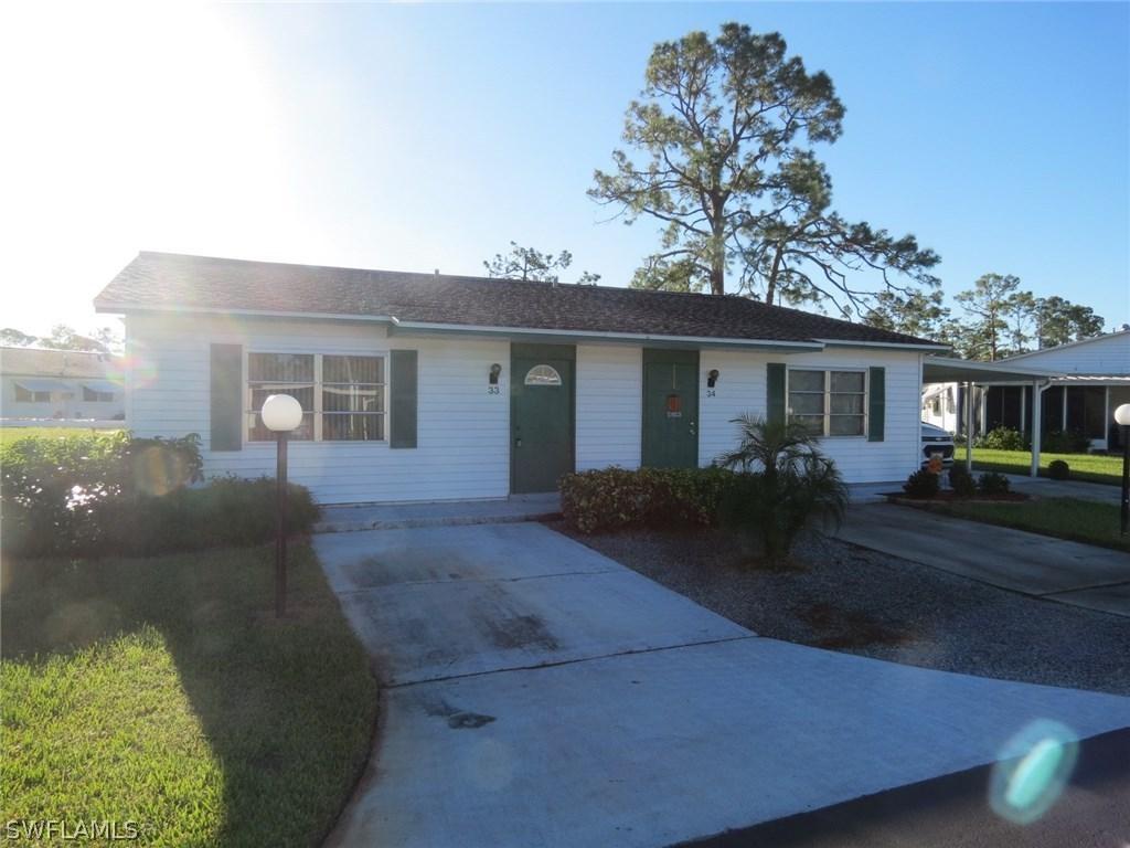 33 Dawn Flower Cir., Lehigh Acres, FL 33936