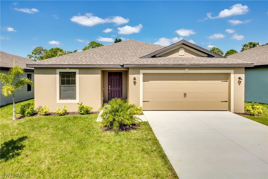 411 Shadow Lakes Dr., Lehigh Acres, FL 33974
