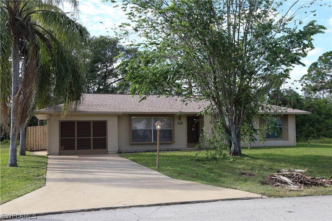 315 Mcarthur Ave., Lehigh Acres, FL 33936