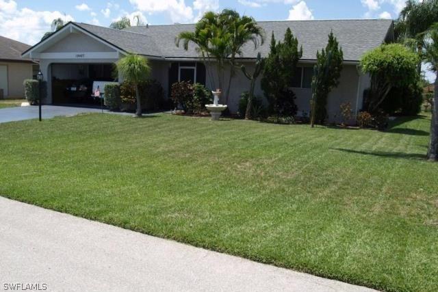 19487 Poppytree Ct., Lehigh Acres, FL 33936