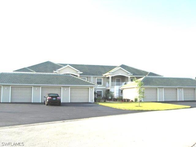 2261 Somerset Ridge Dr. #202, Lehigh Acres, FL 33973