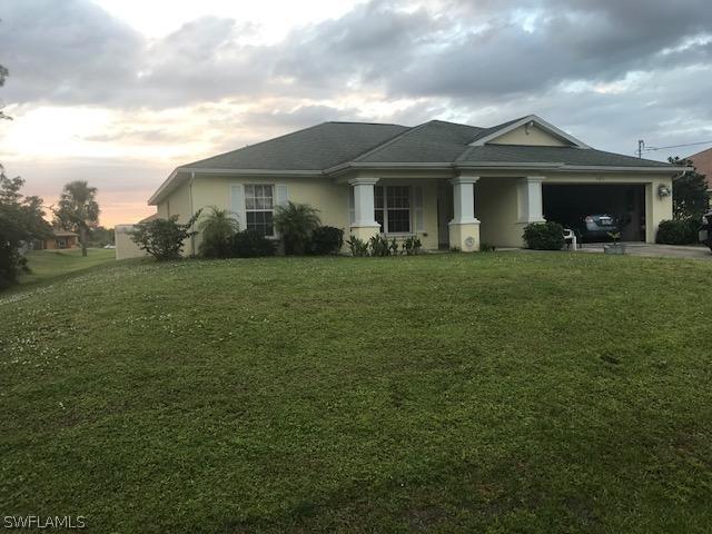 1017 Angelo Ave., Lehigh Acres, FL 33971