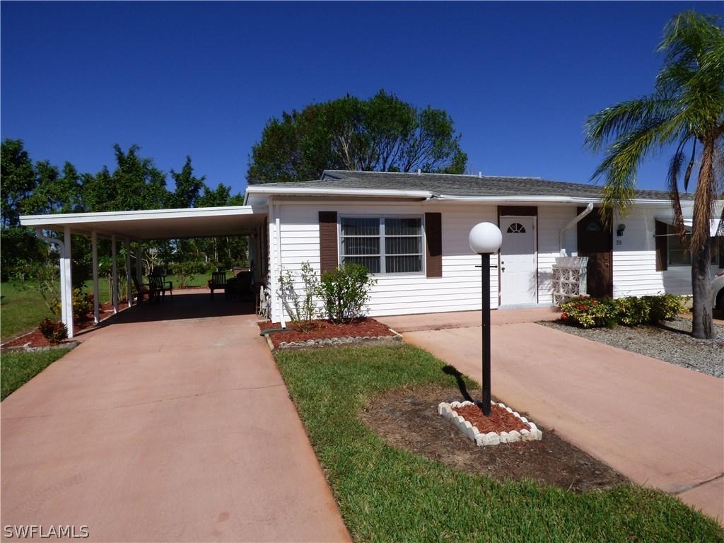 30 Dawn Flower Cir., Lehigh Acres, FL 33936