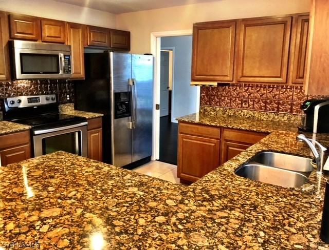 9826 Country Oaks Dr., Fort Myers, FL 33967