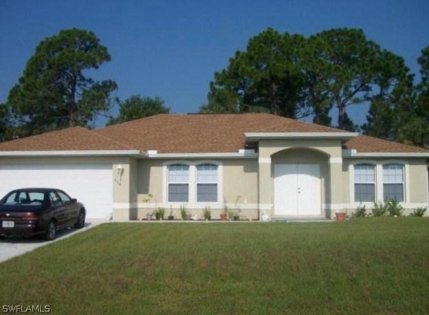 516 Powell Ave., Lehigh Acres, FL 33974