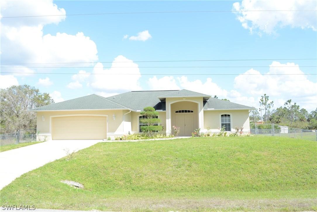 1104 Plumosa Ave., Lehigh Acres, FL 33972