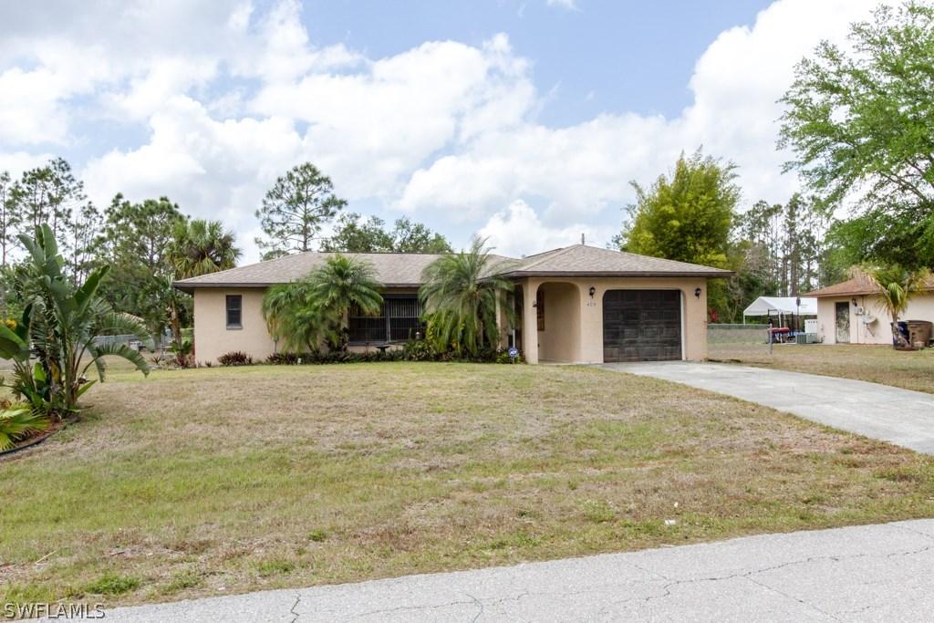 409 Mcarthur Ave., Lehigh Acres, FL 33936