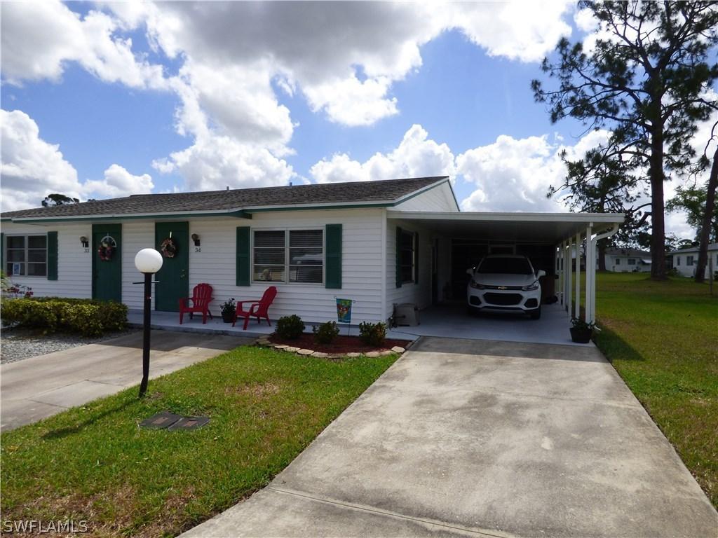 34 Dawn Flower Cir., Lehigh Acres, FL 33936