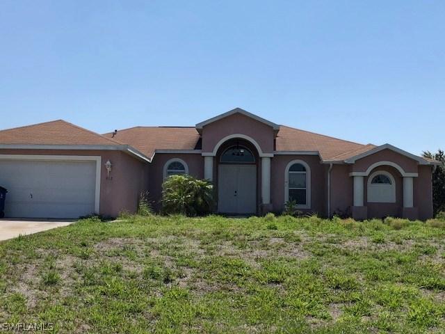 912 Poinsettia Ave., Lehigh Acres, FL 33972