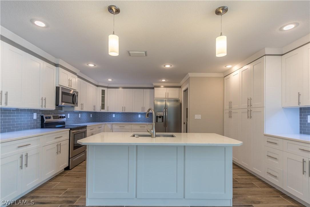 1023 Alfreda Ave., Lehigh Acres, FL 33971