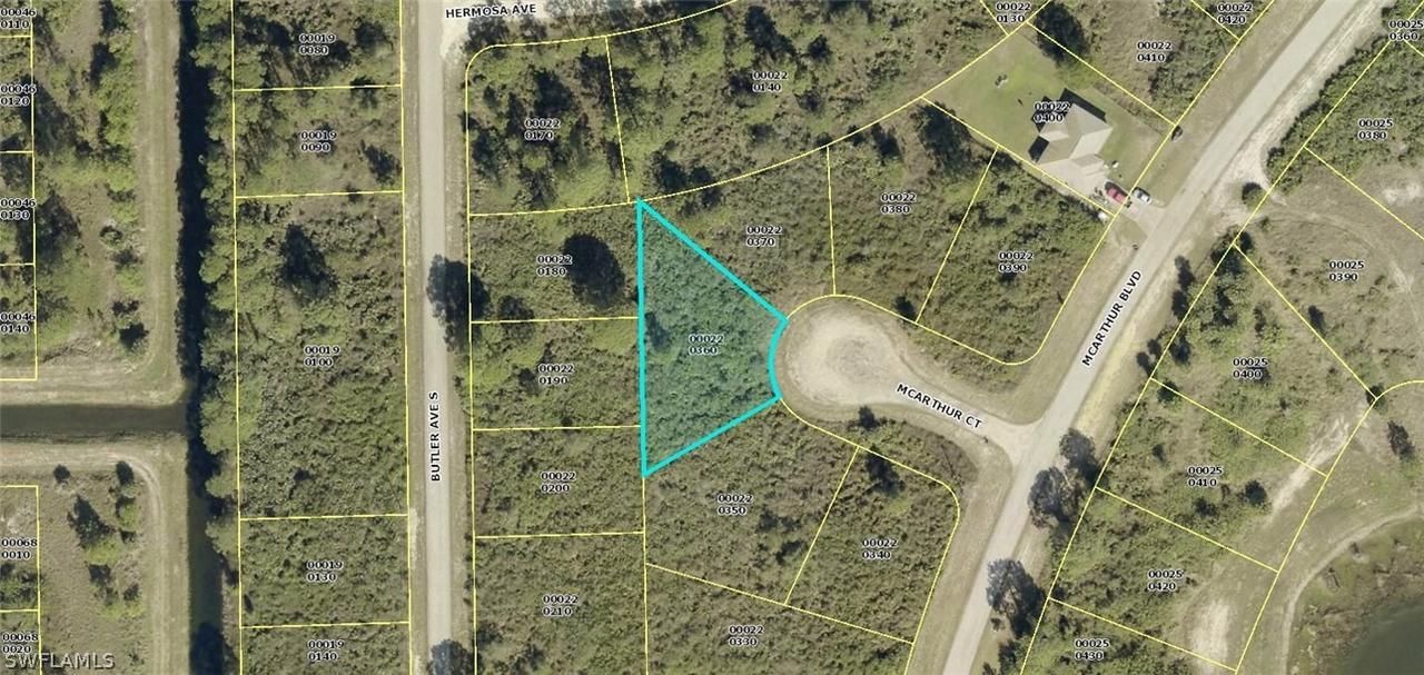 910 Mcarthur Ct., Lehigh Acres, FL 33974