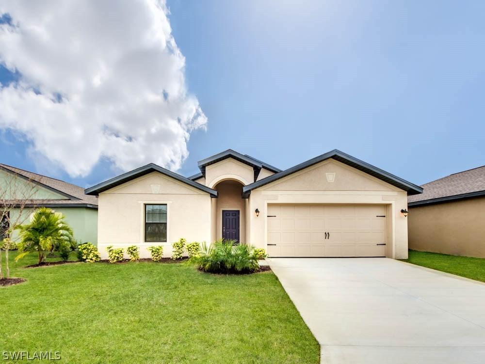 710 Center Lake St., Lehigh Acres, FL 33974