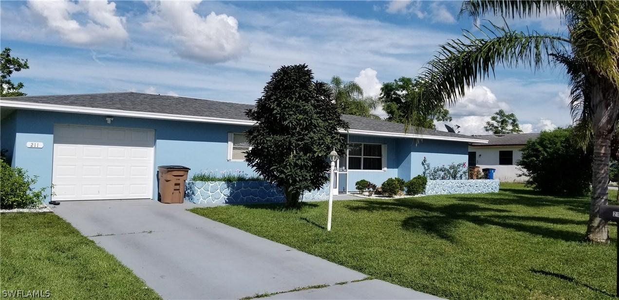 211 Lake Dr., Lehigh Acres, FL 33936