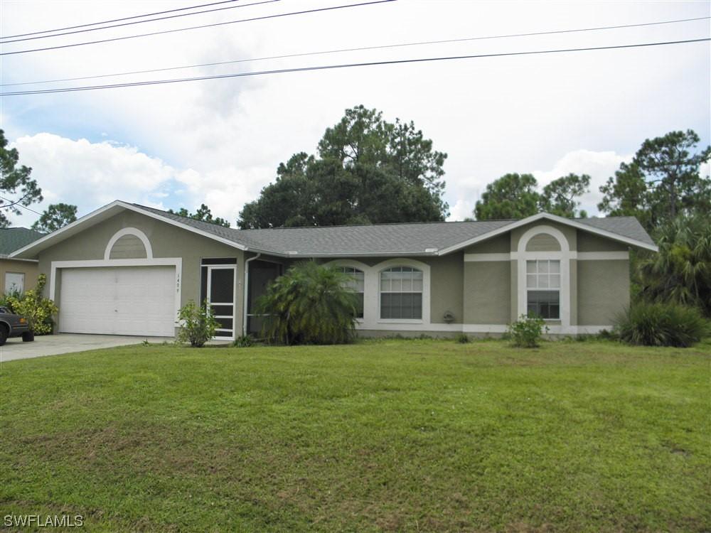 1409 Flora Ave., Lehigh Acres, FL 33971