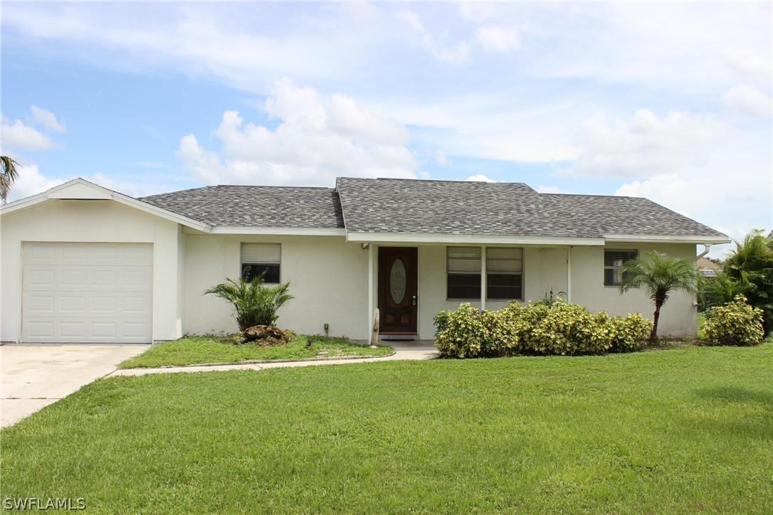 406 Cactus Cir., Lehigh Acres, FL 33936
