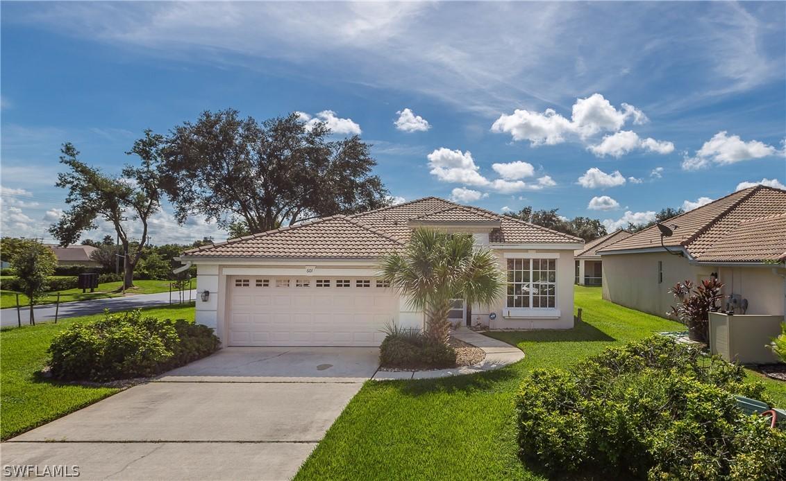 601 Aston Lake Ct., Lehigh Acres, FL 33974