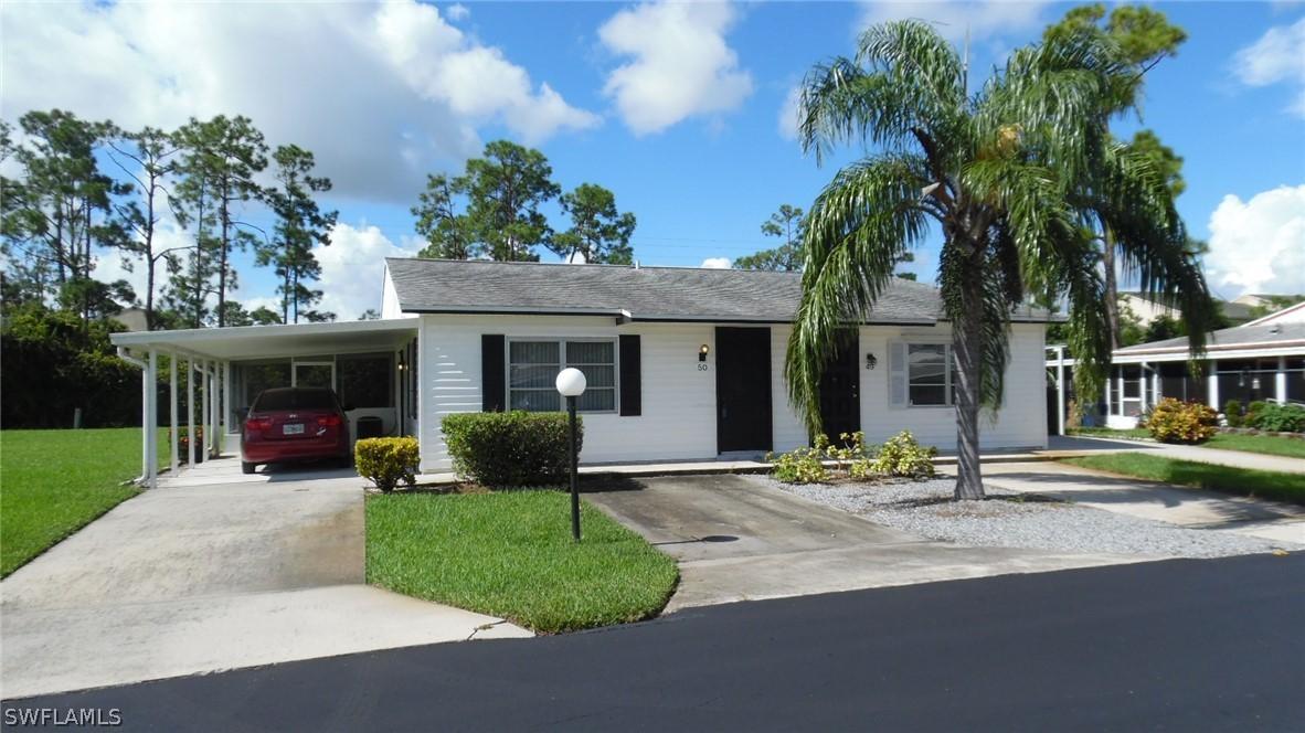 50 Dawn Flower Cir., Lehigh Acres, FL 33936