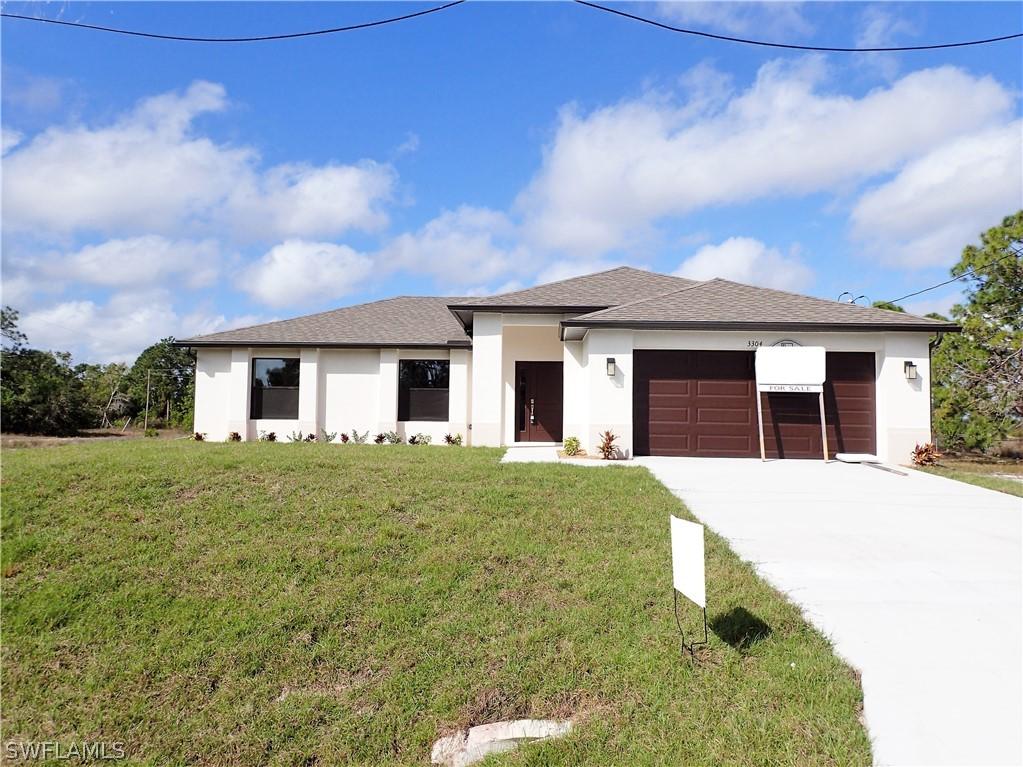 3304 Vera Ave., Lehigh Acres, FL 33976
