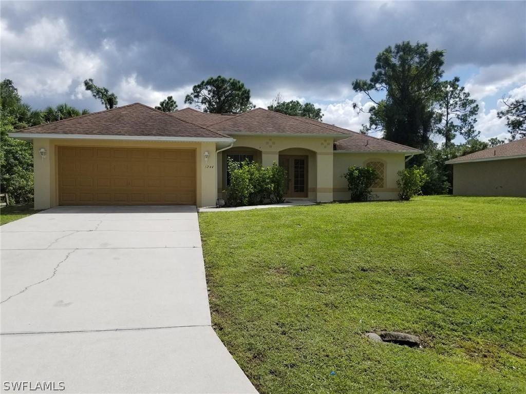1244 Chrisholm St., Lehigh Acres, FL 33974