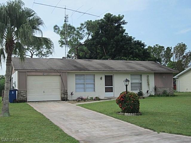 14 Palm Blvd., Lehigh Acres, FL 33936