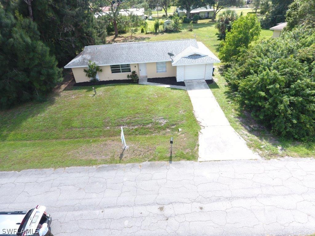 702 Monroe Way, Lehigh Acres, FL 33936