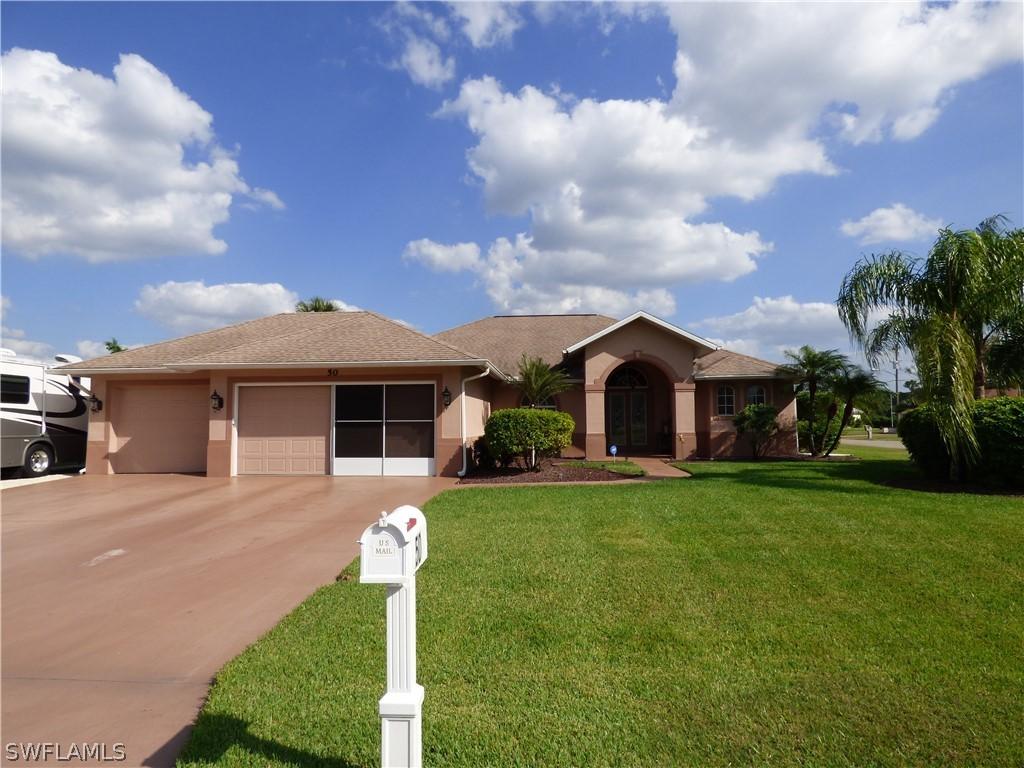 50 Riviera St., Lehigh Acres, FL 33936