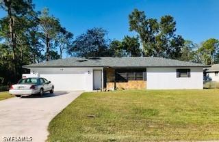 119 Truman Ave., Lehigh Acres, FL 33936