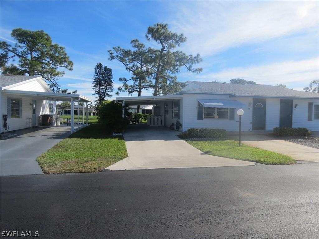 18 Dawn Flower Cir., Lehigh Acres, FL 33936