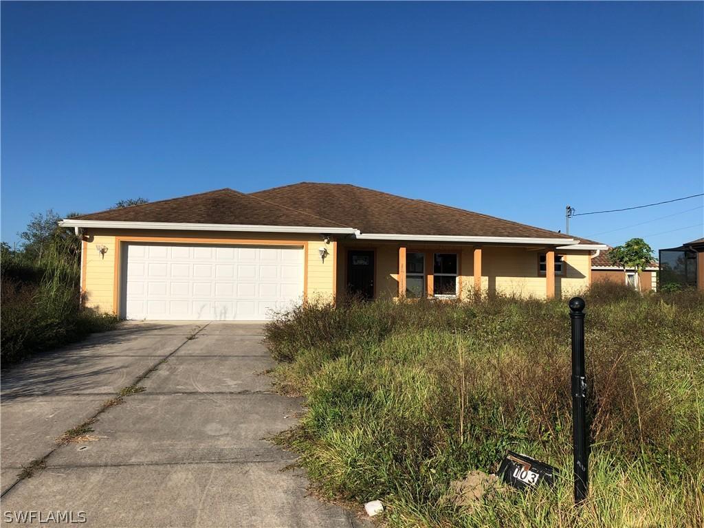 103 Olive Ct., Lehigh Acres, FL 33971