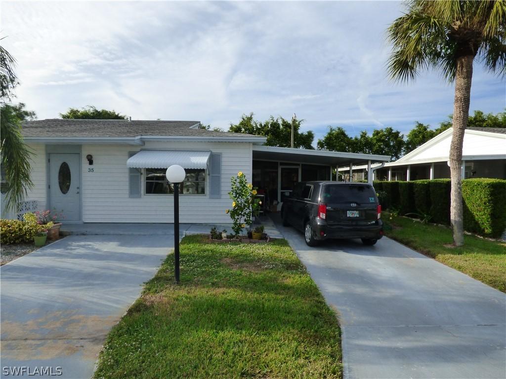 35 Dawn Flower Cir., Lehigh Acres, FL 33936