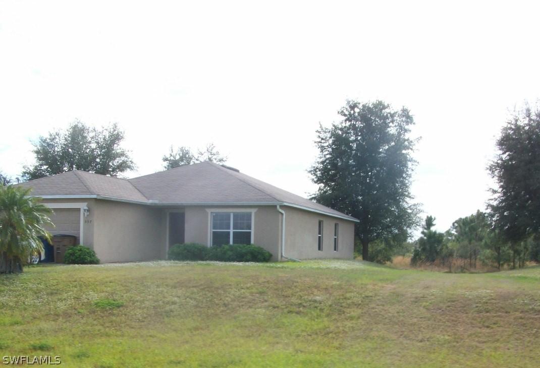557 Windermere Dr., Lehigh Acres, FL 33972