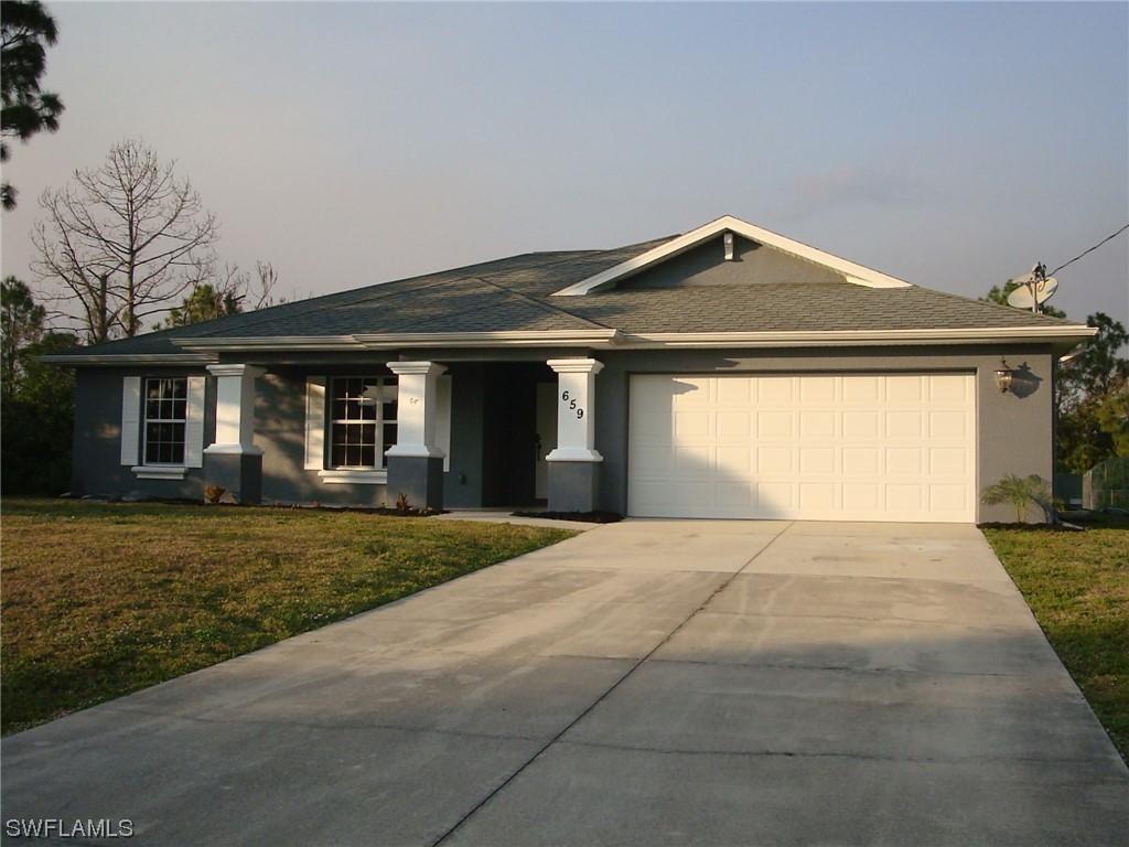 659 Keller St., Lehigh Acres, FL 33974