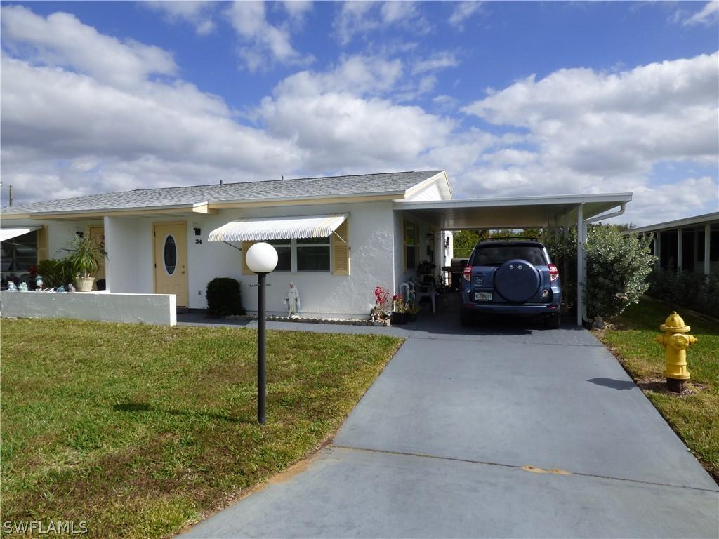 34 Heath Aster Ln., Lehigh Acres, FL 33936