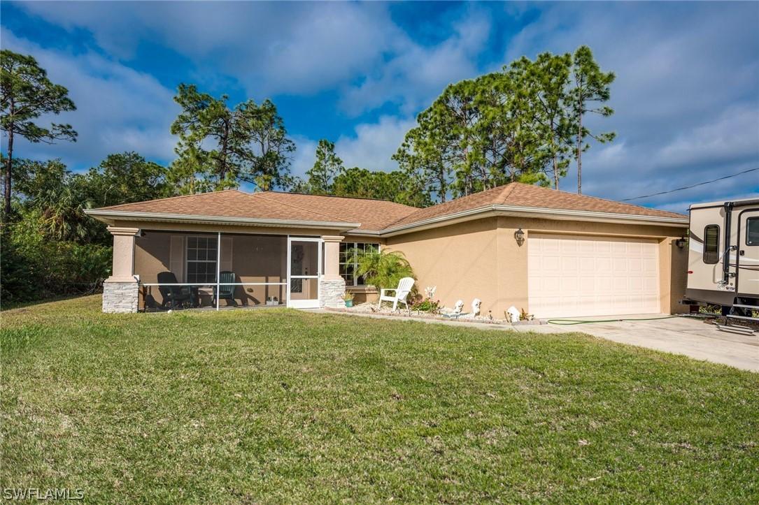 1209 Flora Ave., Lehigh Acres, FL 33971