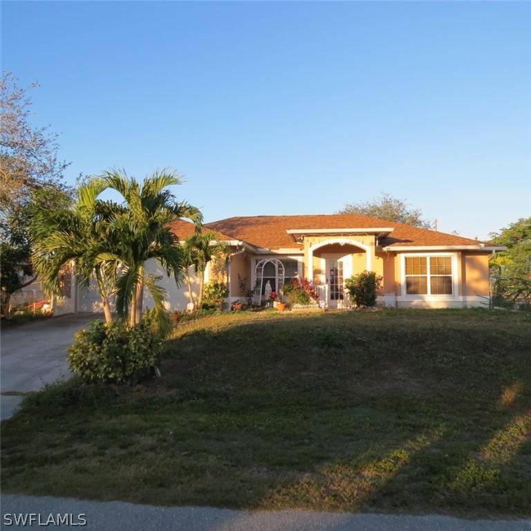 819 Champion Ave., Lehigh Acres, FL 33971