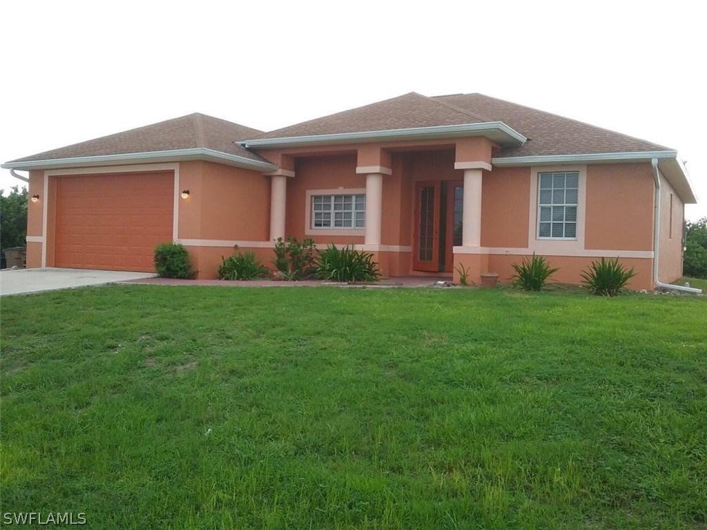 909 Tena Ave., Lehigh Acres, FL 33971