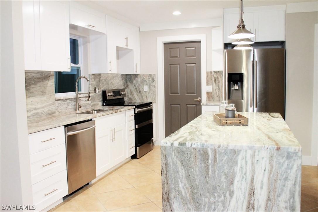 203 Redcliff Ave., Lehigh Acres, FL 33936