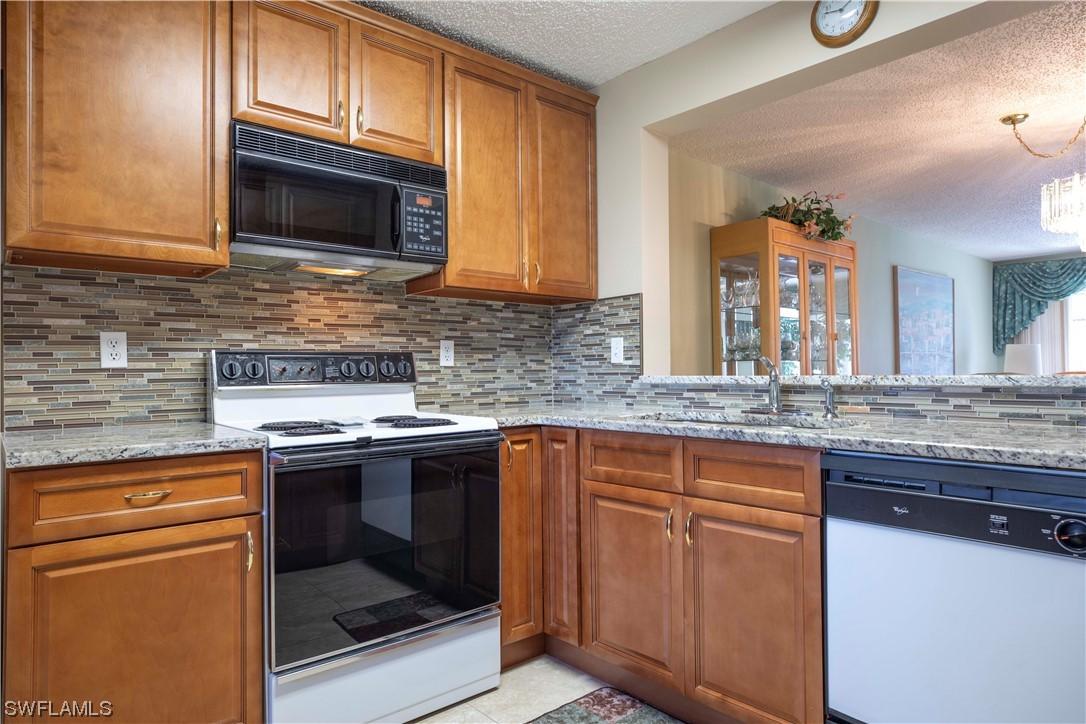 709 Landover Cir. #102, Naples, FL 34104